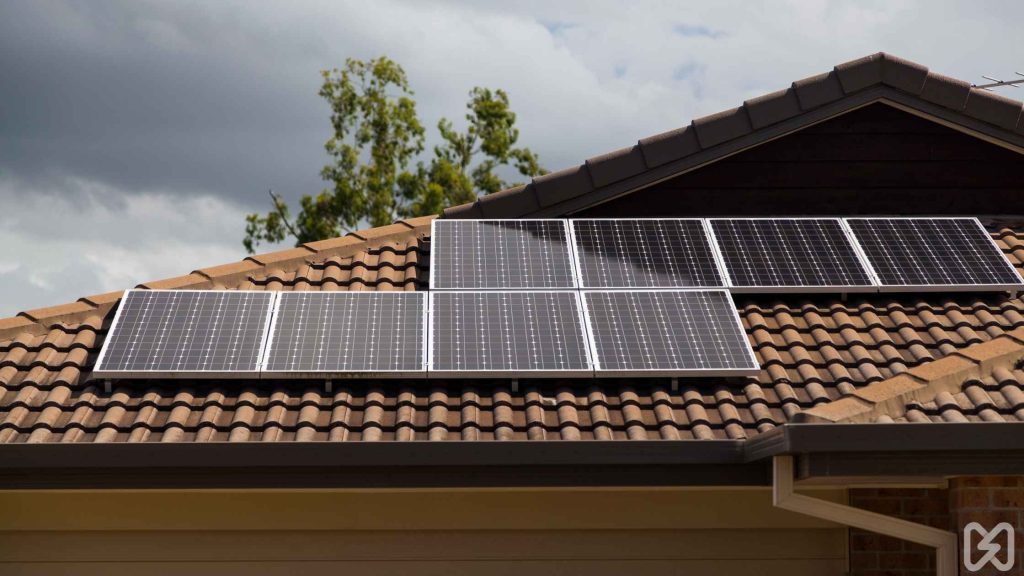 A residential home with a solar panel system installed on the roof. Compare different types and the cost of solar panels South Africa for the best choice.