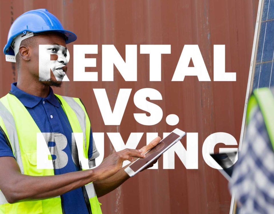 A solar installer in a safety vest and helmet discusses a rent solar system contract with a client near a solar panel installation.