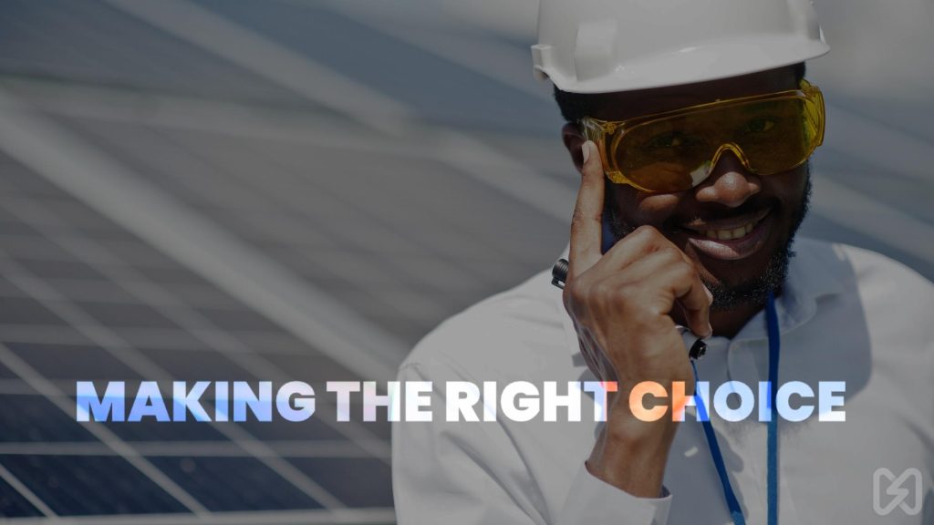 A smiling solar technician pointing to his helmet, symbolizing the decision-making process between renting and buying a solar system.